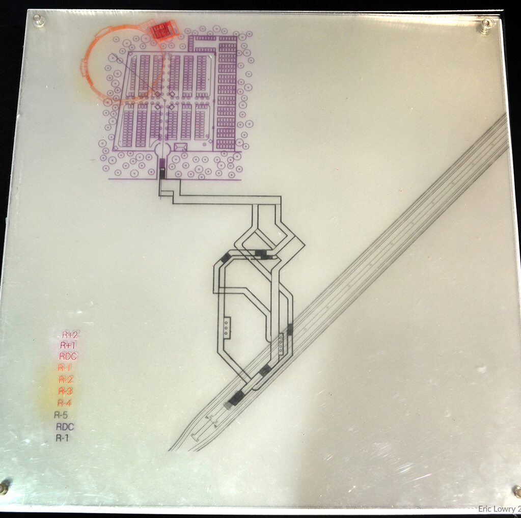 Top view of the architectural plans for Unstant, printed on transparent sheets to account for overlapping spaces